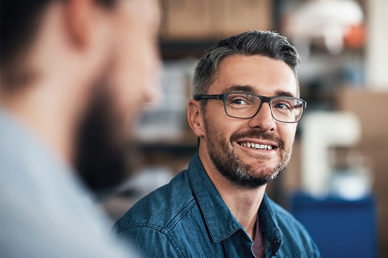 Young Adult Man Listening to Peer Talk