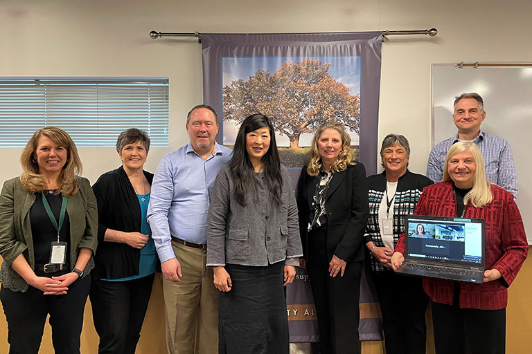 Left to Right: Jen Muckey, Dana Grisham, Dr. Chad Morris, Dr. Cindy Morris, Debbie Kohl, Carole Boye Todd Reckling, Aileen Brady, Denise Stuart on Zoom