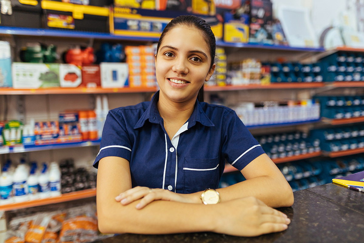 Woman working counter at store